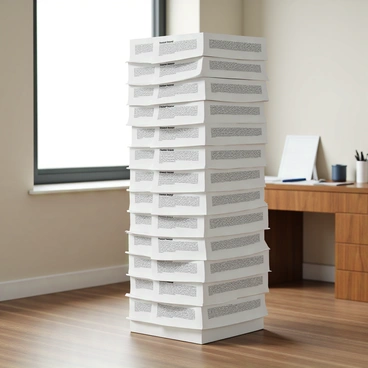 A towering stack of "inforce illustration request forms" is positioned in an office corner. The forms are neatly arranged but extend high, creating a sense of height and volume. The paper is white, with printed text in black ink, and some forms are slightly crinkled at the edges. The background features a wooden desk with a few scattered office supplies, such as a pen and a notepad. The walls are painted a soft, neutral color, and a window allows natural light to illuminate the scene, casting gentle shadows on the stack of papers.