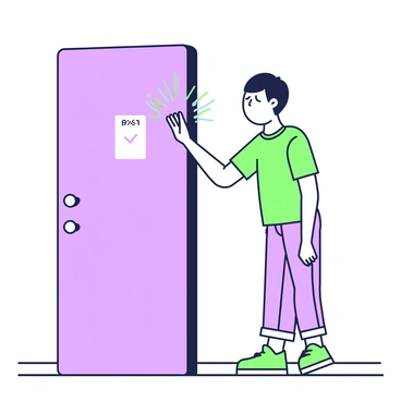 A person is standing in front of a closed door, reaching out to touch a doorknob. They have short hair and are wearing a casual t-shirt and jeans. Their expression shows discomfort as they wince from a tiny static shock that has just occurred. Sparks are visible at the point of contact between their fingers and the doorknob. The background contains a plain wall and a floor that indicates an indoor setting.