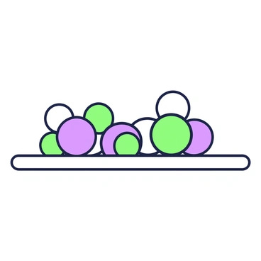 An assortment of table tennis balls scattered on a table. The balls are in different sizes, arranged randomly across the surface. Some balls are partially overlapping, while others are positioned farther apart. The table is plain, providing a neutral background for the balls. The overall composition features a dynamic arrangement that highlights the variety in the shapes and sizes of the balls.