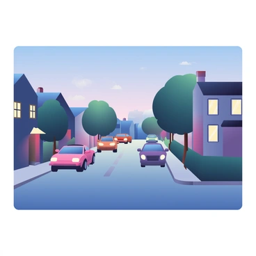 A quiet suburban street is visible during the evening hours. The sky is painted with soft shades of dusk, transitioning from blue to deep purple. Several cars are parked along the sides of the street, their headlights illuminating the surroundings. There are houses lining the street, each with warm lights glowing from the windows, suggesting life inside. A few trees, their silhouettes dark against the fading light, stand in front of the homes, adding to the serene atmosphere of the scene.
