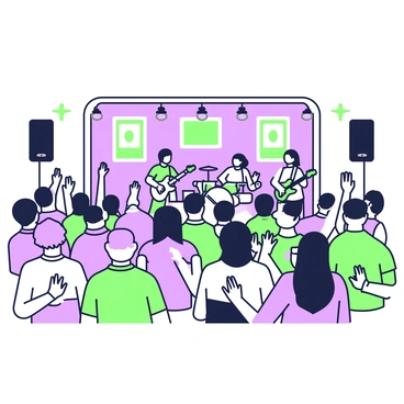 A crowd of people is gathered in an indoor venue, all facing the stage where a band is performing. The audience consists of individuals of various ages and styles, some clapping their hands and others holding their phones up to capture the moment. The band members are visible on stage, with one person playing an electric guitar, another on drums, and a singer with a microphone. Bright lights illuminate the scene, creating a dynamic atmosphere as the energy of the crowd is palpable. Several colorful banners and posters decorate the walls behind the band, enhancing the lively ambiance of the concert.