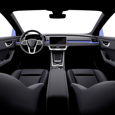 A car interior featuring a sleek black leather driver's seat and a matching passenger seat. The center console is prominently displayed in the middle, with silver trim and a touchscreen display. The dashboard is equipped with modern controls and gauges, all showing a digital design. Ambient lighting in blue highlights the contours of the interior, and there are cup holders integrated into the console. The view captures a panoramic perspective that emphasizes the spaciousness of the interior.