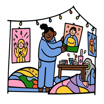A student with light skin and short black hair is standing in a small dorm room, surrounded by colorful illustrated posters. The posters feature vibrant designs and unique characters, showcasing the student's artistic style. The student is wearing a blue hoodie and jeans, smiling as they hang a poster on the wall. The room has a cozy atmosphere, with a bed covered in a colorful blanket, a desk cluttered with art supplies, and string lights illuminating the space.