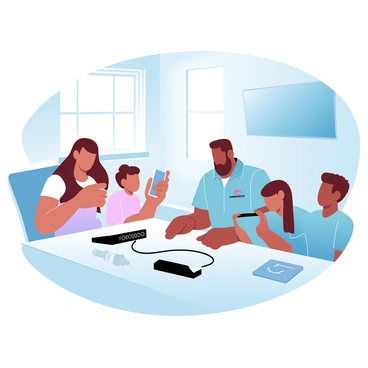 A technician is sitting at a modern table in a well-lit living room, connecting cables to a sleek router. The technician is wearing a branded shirt and has tools laid out next to him. A family of four, consisting of two adults and two children, is gathered around him. One adult is holding a smartphone while the other is looking at the router with curiosity. The children are playing with a tablet nearby. A large wall-mounted TV is visible in the background, and there is a window letting in natural light.