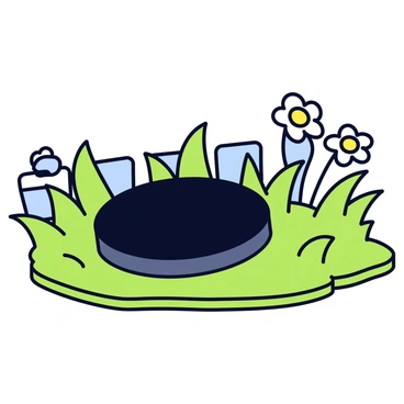 A hockey puck laying on a patch of green grass in a backyard