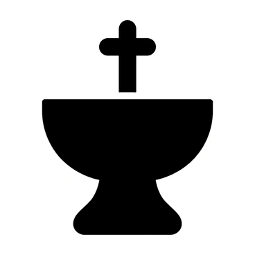 An ornate baptismal font made of stone with intricate carvings, filled with clear water reflecting the light.