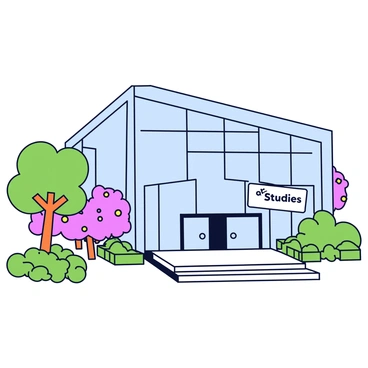 A sleek, modern building with large glass windows and a smooth exterior, reflecting the surrounding greenery. The structure features angular lines and a minimalist design, with a prominent entrance that includes wide steps leading to double doors. Surrounding the building are flowering trees and neatly trimmed bushes, creating a vibrant atmosphere on the university campus. A sign near the entrance reads "Art Studies" in bold letters.