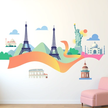A wall is covered with a collage featuring various famous cultural landmarks from around the world. In the center, there is the "Eiffel Tower" with its intricate ironwork. To the left, a depiction of the "Great Wall of China" stretches across, showcasing its winding path through mountains. On the right, the "Taj Mahal" stands majestically with its white marble domes. Above, the "Statue of Liberty" is shown, holding its torch high. Below, the "Colosseum" is partially visible, with its iconic arches. The collage includes vibrant colors and varying perspectives to create an engaging visual display.