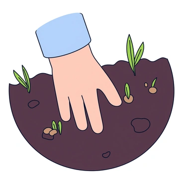 A close-up view of a farmer's hand carefully planting seeds into rich, dark soil. The hand is positioned in a way that shows the fingers gently placing the seeds in a straight line. The surrounding soil appears moist and finely textured, with small clumps visible. Green shoots are seen emerging nearby, indicating growth in the farm field. The farmer's arm is slightly visible, wearing a light blue shirt, emphasizing the labor being undertaken.
