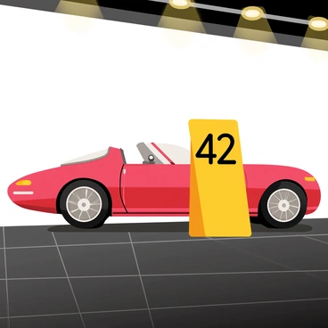 A bright yellow lot number sign displaying the number "42" stands prominently next to a shiny red luxury car. The car has a sleek aerodynamic design with polished chrome wheels and a glossy finish that reflects the surrounding lights. The auction display area features a clean white backdrop, enhancing the car's vibrant color and highlighting the lot number sign. The floor is made of smooth black tiles, adding contrast to the scene.