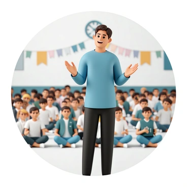 A male teacher, wearing a blue shirt and black trousers, stands on a stage in front of an audience of students. He has short brown hair and a bright smile, gesturing with his hands as he greets the students. The assembly hall is filled with students of various ages, some sitting cross-legged on the floor and others standing in groups. Banners hang from the walls, and there is a large clock visible above the stage, indicating the morning time. The atmosphere is lively, and the teacher's body language conveys enthusiasm and energy as he engages with the audience.