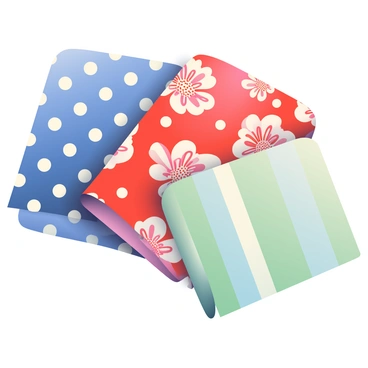A collection of three-dimensional fabric swatches is arranged in an appealing display. Each swatch showcases a different color and pattern. One swatch is a deep blue with white polka dots, while another features a vibrant red with intricate floral designs. A third swatch displays a soft pastel green with horizontal stripes. The textures of the fabrics are depicted with fine details, capturing the softness and richness of each material. The lighting emphasizes the folds and curves of the swatches, creating depth and an engaging visual experience.