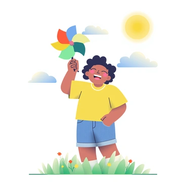 A child with curly black hair is joyfully holding a colorful pinwheel in their right hand. The pinwheel features vibrant sections of red, blue, yellow, and green. The child is wearing a bright yellow t-shirt and denim shorts. They are standing in an open grassy field dotted with small wildflowers. The sun is shining brightly in the sky, and a few fluffy white clouds are scattered throughout. The child's face is lit up with a big smile as they watch the pinwheel spin rapidly in the gentle breeze.