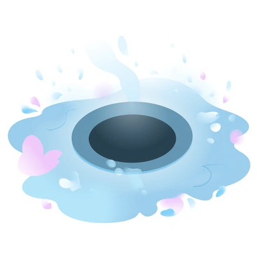 Water flowing into a street drain during a light rain