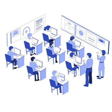 A classroom filled with students seated at individual desks, each working on computers. Some students are focused intently on their screens while others are looking up with hands raised, signaling for assistance. The desks are arranged in rows, and there are various educational posters displayed on the walls. A teacher stands at the front of the room, observing the students and preparing to assist those in need. The classroom is well-lit, creating an atmosphere of learning and engagement.