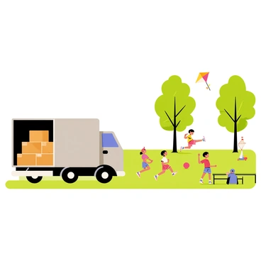 A large gray moving truck is parked beside a vibrant city park. The truck has an open back, revealing cardboard boxes stacked neatly inside. In the park, children are playing joyfully on the green grass, some are flying colorful kites, while others are playing with a bright red ball. Tall trees with lush green leaves sway gently in the breeze, creating a lively atmosphere. A few benches are visible, with people sitting and watching the playful scene unfold.