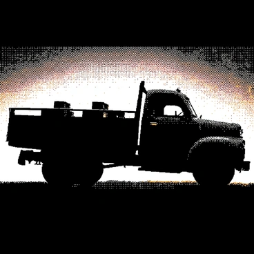 A truck is positioned in the foreground, its shape forming a dark silhouette against a vibrant sunset. The sunset features a gradient from deep black at the top to lighter areas near the horizon, with glowing bricks visible in the truck's cargo area. These bricks emit a radiant light, creating a contrast against the truck's dark outline and illuminating the space nearby. The scene captures the truck's design, showcasing its wheels and cargo area distinctly.