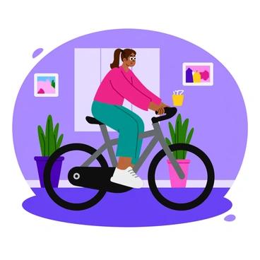 A person is riding a Peloton bike in a dimly lit room. The scene features soft ambient lighting that casts gentle shadows across the floor. The rider is focused, wearing athletic gear, and the bike is prominently displayed. There are small decorative elements in the background, including plants and framed pictures, adding a cozy touch to the atmosphere. The overall setting suggests a comfortable and inviting space for evening exercise.