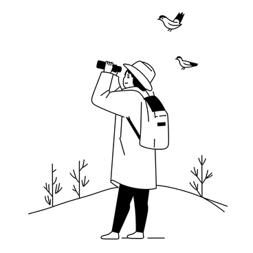 A person standing on a grassy hill in a nature reserve, holding binoculars up to their eyes. They are wearing a wide-brimmed hat and a light jacket, with a backpack slung over one shoulder. Surrounding them are various trees and shrubs, adding to the natural environment. The individual looks focused and engaged, scanning the sky for birds. In the background, a few birds can be seen perched on branches or flying.