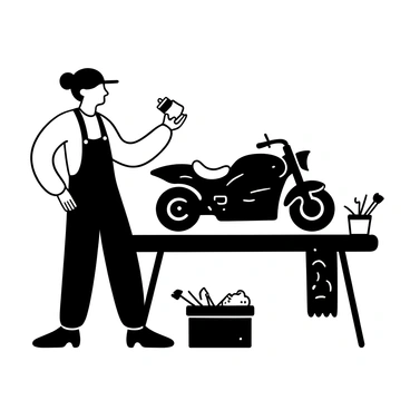 A painter wearing a sturdy apron is standing next to a motorcycle with a shiny black body. The painter holds a paintbrush in one hand and a small can of paint in the other. The motorcycle is positioned on a workbench, surrounded by various painting tools and a drop cloth underneath. The painter is focused on applying touch-up paint to a small scratch on the motorcycle's body, with careful strokes. There are paint splatters on the workbench and a clean rag hanging from the side. A toolbox is placed nearby, containing additional tools for maintenance.