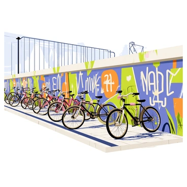 An industrial area with a concrete pavement and several metal structures in the background. There are multiple bicycles parked in neat rows beside a wall covered in vibrant graffiti art. The graffiti features colorful designs, including abstract shapes and urban themes. The scene is illuminated by bright daylight, highlighting the textures of the wall and the shiny surfaces of the bikes.