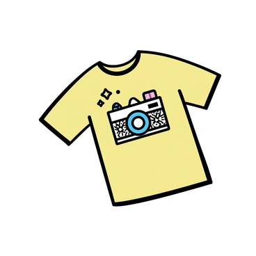 A vintage camera with a whimsical design, featuring intricate patterns and playful motifs, is centered on a mustard yellow shirt. The camera has a classic shape with a round lens and a prominent flash, both adorned with decorative elements. The shirt is made of soft fabric with a smooth texture, and the vibrant mustard yellow color provides a striking backdrop for the detailed camera design.