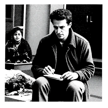 A thoughtful muckraker is seated on a worn wooden bench in a dimly lit alley. He has unkempt hair and is dressed in a rugged coat. He is focused on sketching in a worn-out notebook, which rests on his lap. His brow is furrowed in concentration as he captures the details of his surroundings. Surrounding him are scenes of poverty, including a tattered blanket draped over a cardboard box and a child with dirty clothes playing with a broken toy nearby. The atmosphere is filled with a sense of urgency as he documents the struggles around him. The muckraker's pencil moves rapidly across the paper, leaving behind intricate lines and shading that reflect the plight he observes.