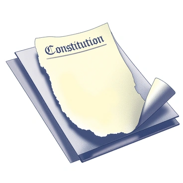 An old document titled "Constitution" rests on a textured surface. The paper appears worn and yellowed, with frayed edges and visible creases. The title "Constitution" is prominently displayed at the top of the document in a bold, serif font. The document is positioned so that it is partially torn in half, with one side hanging down slightly, revealing the text along the tear. Light shadows play across the surface, enhancing the aged look of the document.