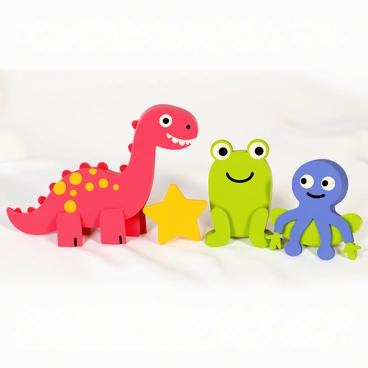 A colorful set of toys sculpted from polymer clay, featuring a cheerful red dinosaur, a bright yellow star, a blue octopus with large eyes, and a green frog with a big smile. Each toy has a distinct texture, with the dinosaur displaying bumpy scales, the star having a smooth surface, the octopus showcasing wavy tentacles, and the frog showing small, detailed features like its bulging eyes and webbed feet. The toys are arranged on a soft white surface, creating an inviting and playful scene.
