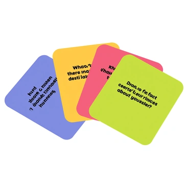 A deck of colorful cards arranged in a fan shape, showcasing various icebreaker questions and activities. Each card features a distinct bright color, such as blue, yellow, red, and green. The front of the cards displays different activities and questions in bold black text, such as "What's your favorite travel destination?" and "Share a fun fact about yourself." The cards have rounded corners and a glossy finish, giving them a playful and inviting appearance.