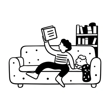 A child reading a book that's upside down, sitting on a couch