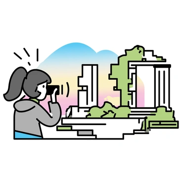 A photographer, wearing a gray jacket and holding a camera, is positioned in front of a set of ancient ruins. The ruins are composed of weathered stone columns and crumbling walls, partially covered with green vines. The scene is illuminated by the soft light of dawn, casting long shadows and creating a gentle glow on the stones. The photographer is focused intently on framing the perfect shot, with a slight breeze causing their hair to move subtly. The sky is transitioning from deep blue to lighter shades of orange and pink, indicating the early morning hour.