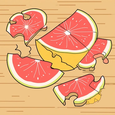 A jigsaw puzzle spread out on a colorful table. The puzzle pieces show a vibrant image of a grapefruit, with its bright pink flesh and yellow outer rind. Each piece is uniquely shaped, clearly displaying sections of the grapefruit, including its juicy segments and a hint of seeds. Some pieces are flipped over, showing their plain cardboard backs. The table underneath the puzzle has a light wooden texture, adding warmth to the scene.