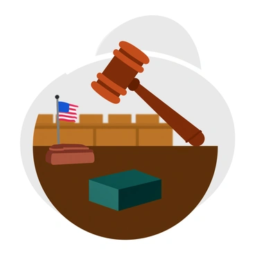 A wooden judge's gavel made of polished mahogany is raised high above a smooth, dark wooden bench. The gavel is poised to strike, showcasing its circular head and sturdy handle. Below the gavel, a dark green sound block is positioned on the bench. A blurred background features rows of wooden seats filled with spectators, and a small American flag stands to one side of the bench. The scene conveys a sense of authority and importance in a courtroom setting.