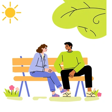 Two people sitting on a wooden park bench under a large leafy tree. One person, a woman with curly brown hair wearing a light blue jacket, is turned slightly toward the other. The other person, a man with short black hair wearing a green sweater, looks engaged as he speaks. The woman has a soft expression, listening intently with her hands resting in her lap. Around them, there are patches of green grass and a few colorful flowers in bloom, and the sun is shining brightly overhead.