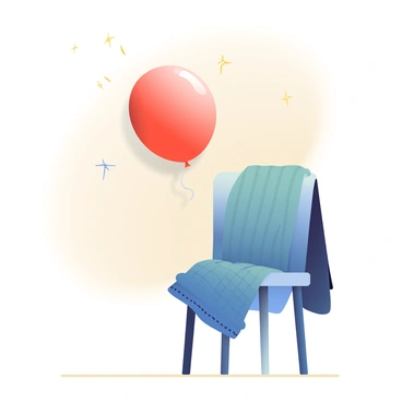 A balloon sticking to a wall after being rubbed on a sweater, demonstrating friction charging