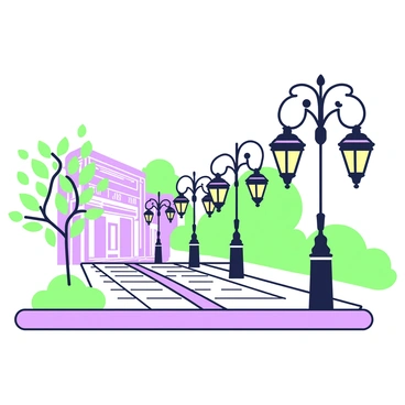 A street adorned with ornamental metal lamps casting warm light