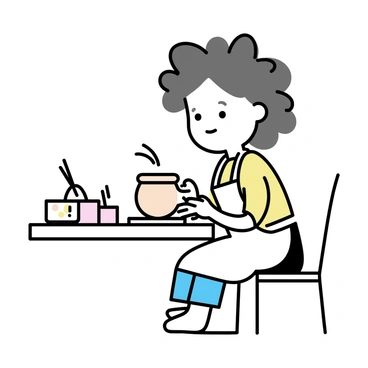 A child with curly hair is sitting at a pottery wheel in a classroom setting. The child is wearing an apron and has clay on their hands. They are shaping a wet clay pot with focused attention, their brow slightly furrowed in concentration. Around them, tools for pottery making are neatly arranged on the table, and there are other partially made pots in various stages of completion nearby. The atmosphere indicates a creative learning environment.