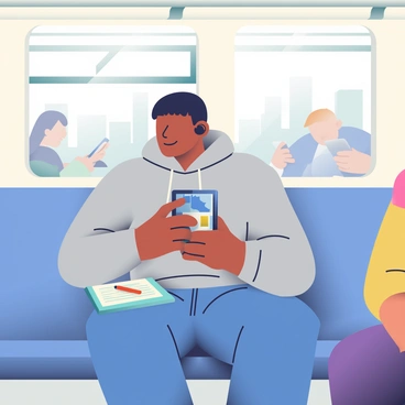 A commuter with medium skin is seated on a subway train. They have short black hair and are wearing a gray hoodie and blue jeans. In their hands, they are holding a smartphone, which is displaying a map application. A tablet is resting on their lap, with a notebook and a pen beside it. The commuter is wearing black wireless earbuds. Behind them, the subway window reveals a blurred view of the cityscape. Other passengers are subtly visible in the background, engaged in their own activities, such as reading or looking at their phones. The overhead lights cast a soft glow over the scene.