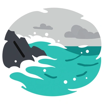 A dramatic scene of crashing ocean waves against a rugged, rocky shore during a storm. The waves are large and frothy, splashing against the dark, jagged rocks. The water is a deep blue-green color, contrasting with the gray, overcast sky. The clouds are heavy and swirl ominously above, hinting at the intensity of the storm. White streaks of foam can be seen at the crests of the waves, and some water droplets are captured in mid-air, illustrating the force of nature.