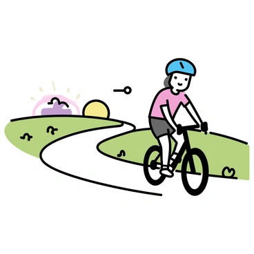 A cyclist, wearing a blue helmet and a red jersey, is riding a sleek black bicycle along a winding path. The path is bordered by green grass and small wildflowers. In the distance, a vibrant horizon filled with shades of orange and purple is visible, indicating a sunset. The sky is clear with a few wispy clouds. The cyclist is focused, pedaling steadily towards the horizon.