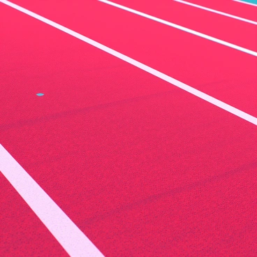 A close-up view of a red running track featuring a textured rubber surface. The track is marked with white lane lines that create distinct lanes for runners. The texture of the rubber is visible, showcasing small grooves and patterns that add realism. There are faint scuff marks from runners, emphasizing the wear and use of the track. The lighting highlights the vibrant red color, making the lane markings stand out prominently against the background.
