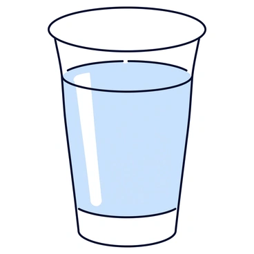 A shot glass with a smooth, clear surface reflecting light. The glass is filled with clear water, visibly transparent. Fresh dew droplets are beaded on the outside of the glass, glistening as they catch the light. The shot glass is placed on a flat, light-colored surface.