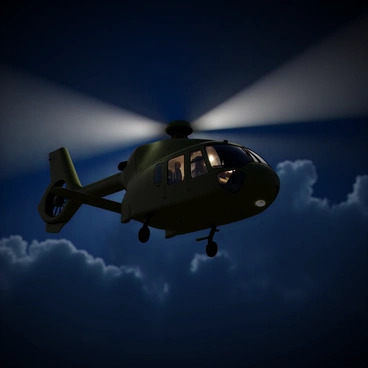 An NH90 helicopter with a sleek, modern design is hovering in the night sky. It features a dark green body with a distinctive tail rotor. The helicopter is illuminated by powerful searchlights that create bright beams piercing through the darkness. The surrounding atmosphere is filled with hints of clouds, reflecting some light from the searchlights. The helicopter's rotors are in motion, and its cockpit windows are softly lit, indicating activity inside. The scene captures a sense of action and precision during a night operation.