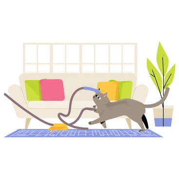 A playful cat curiously chasing a vacuum hose in a living room.