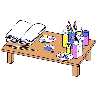 An assortment of art supplies is arranged neatly on a wooden table. There are various tubes of paint in bright colors, alongside several paintbrushes with different sizes and shapes. A few open sketchbooks are stacked, displaying blank pages ready for drawing. The table surface shows a few splatters of paint, indicating recent use, and a palette with mixed colors rests to one side.
