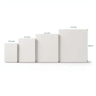 A side-by-side comparison of several illustration boards. The boards vary in size, clearly labeled with their dimensions. One board is labeled "1/3 size," showcasing its dimensions prominently. Each board is placed on a flat surface, with a neutral background to emphasize the differences in size. The boards are positioned to ensure clear visibility of their edges and proportions, allowing for an easy comparison of the sizes.