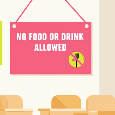 A rectangular sign hanging on the wall of a classroom. The sign has a bright red background with bold white text that reads "No Food or Drink Allowed." The sign features a crossed-out fork and cup icon next to the text. The classroom has a light-colored wall and a chalkboard in the background. Desks and chairs are neatly arranged in front of the sign.