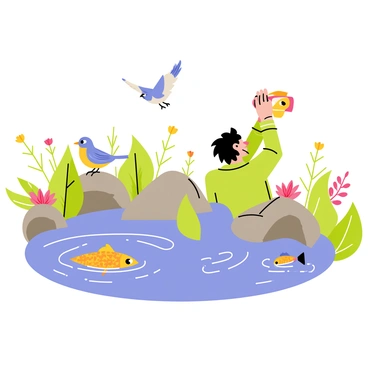 A photographer with a camera raised to their eye is positioned near a fish pond. The photographer has short black hair and is wearing a green jacket. Around the pond, various birds are perched on rocks and gracefully flying above the water. The pond is surrounded by lush green plants and colorful flowers, adding vibrancy to the scene. Reflective ripples can be seen on the surface of the water, where fish are visible swimming beneath. The lighting is bright, indicating a sunny day.