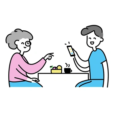 A young adult, wearing a blue t-shirt and jeans, is sitting next to an elderly person in a cozy living room. The young adult has short brown hair and is smiling while pointing at the screen of a smartphone. The grandparent, with gray hair and wearing reading glasses, is attentively looking at the phone. The smartphone displays colorful icons on its screen. A small table with a coffee mug and a bowl of fruit is in the background.